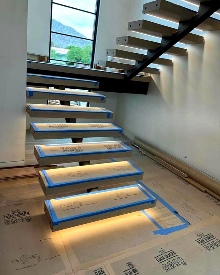 Floating staircase with LED lighting under each step