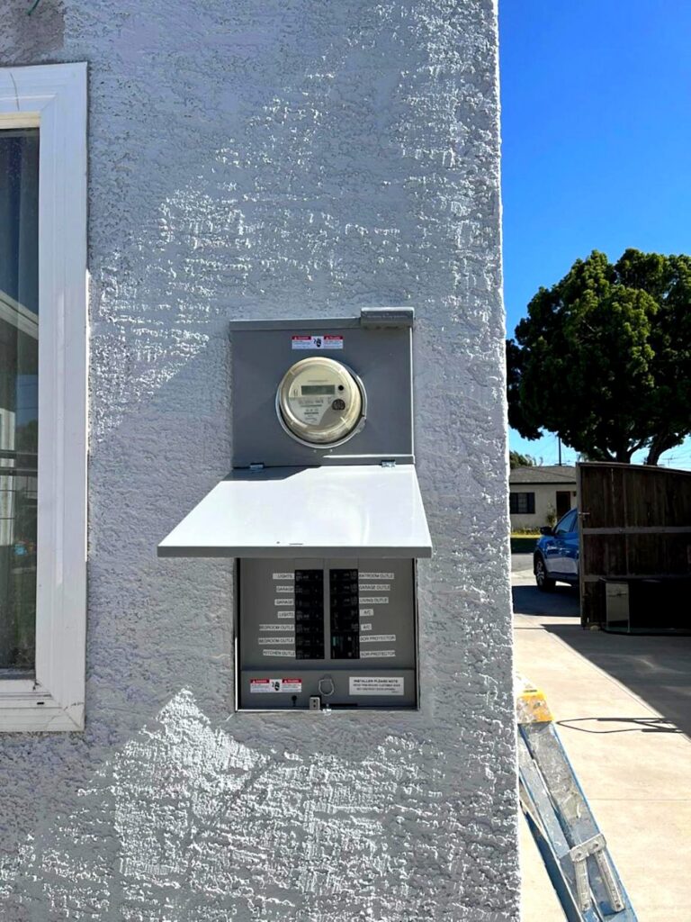 New meter-main panel installed on a stucco wall by Volta Electric