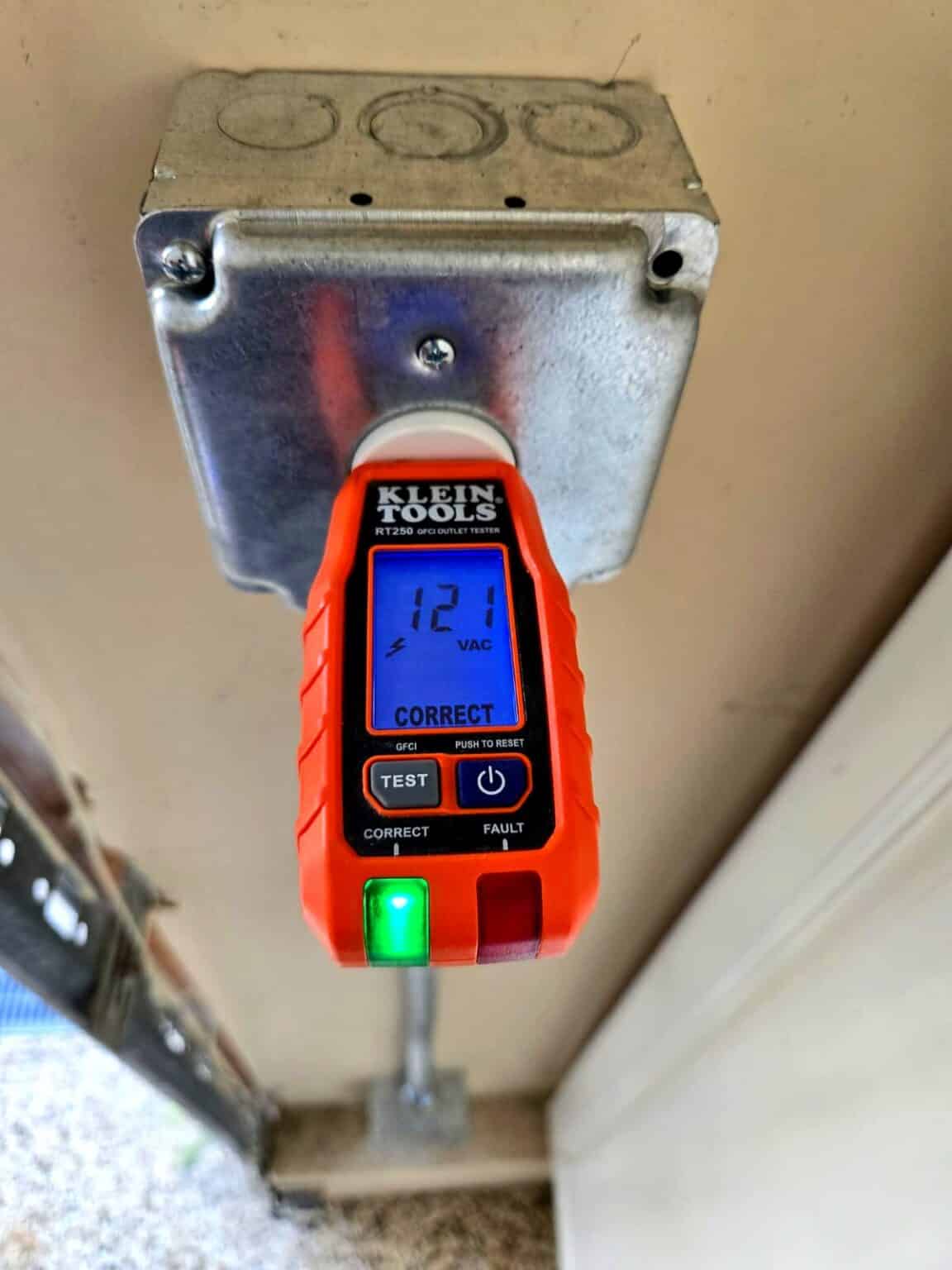 Outlet tester checking a newly wired electrical box