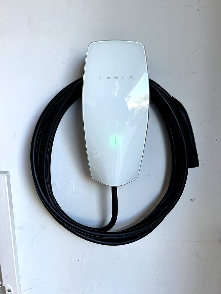 White Tesla Wall Connector installed by Volta Electric