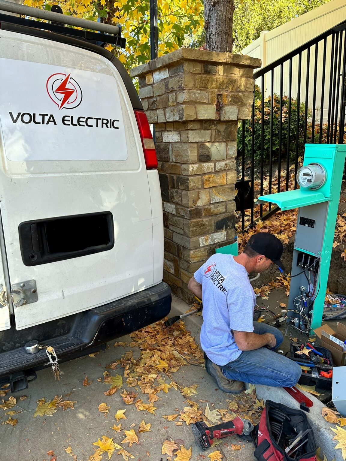 Volta Electric van and electrician at a customer’s home installing a new meter pedestal